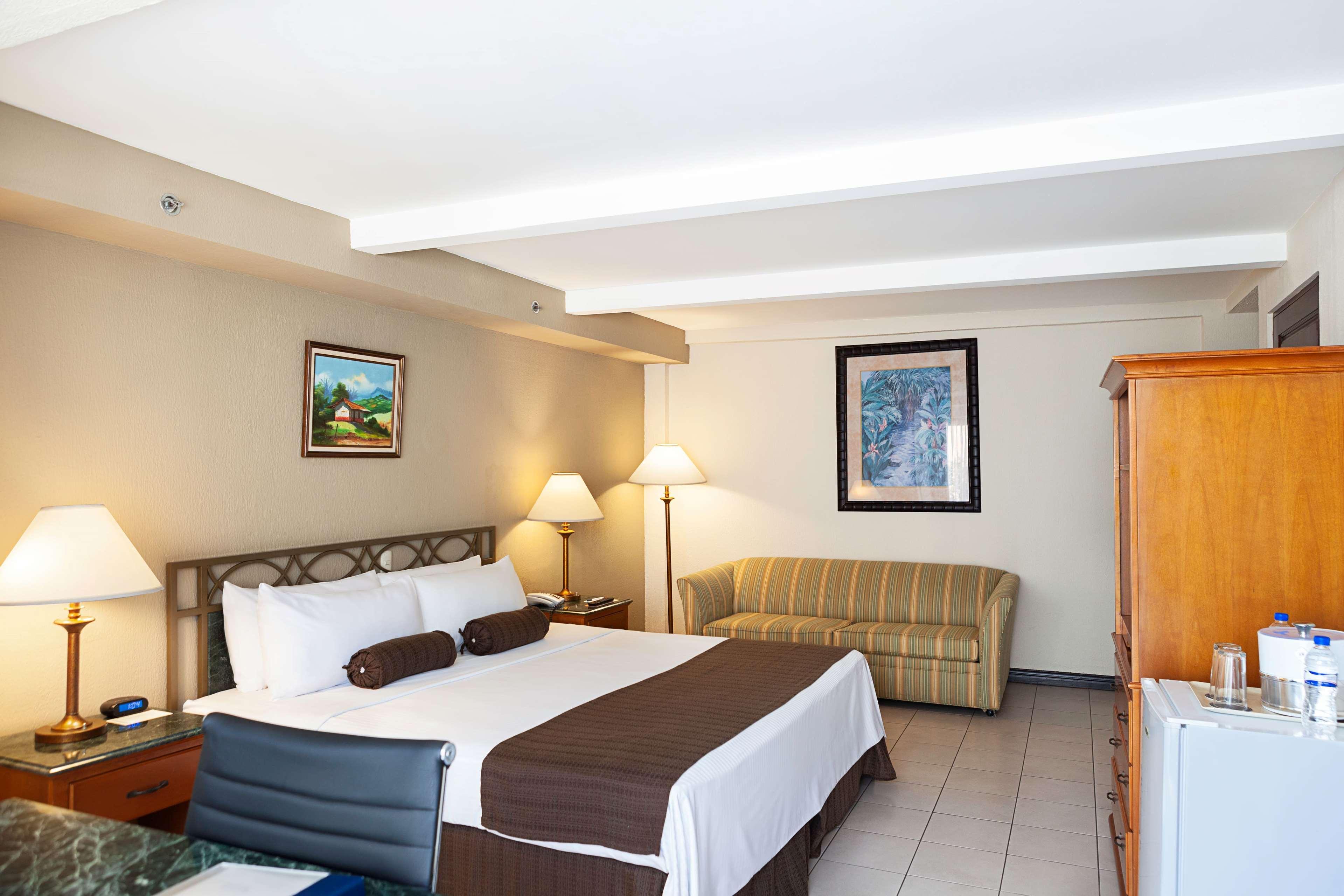 Wyndham San Jose Herradura Extérieur photo A room at the hotel