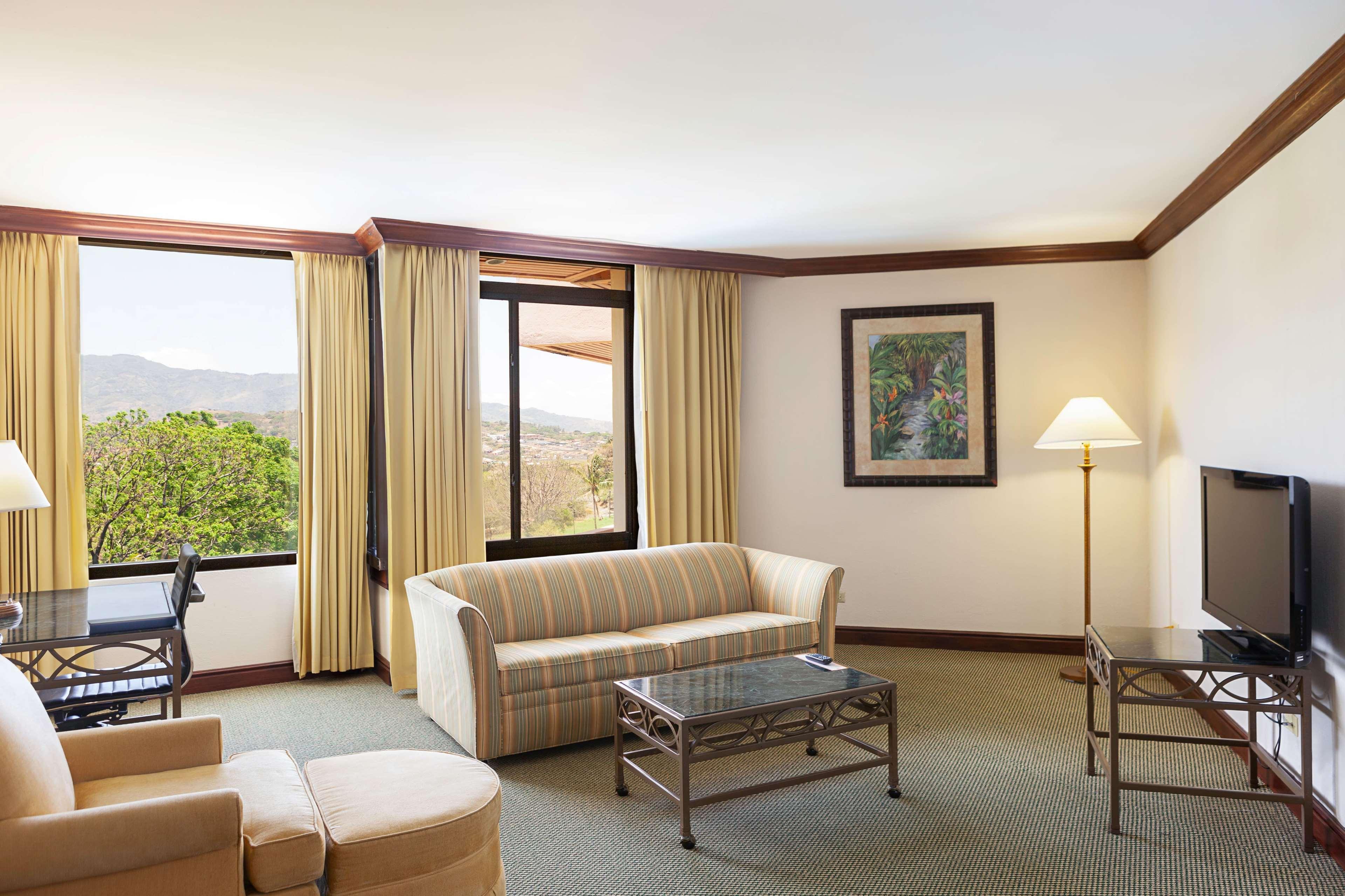 Wyndham San Jose Herradura Extérieur photo Living room